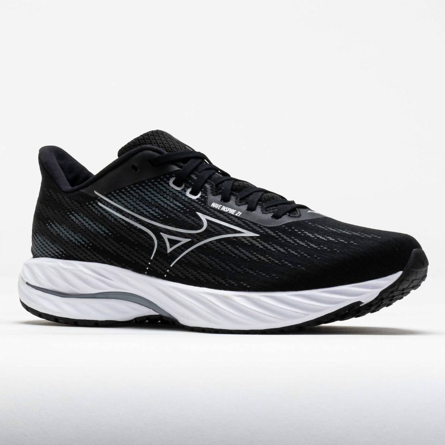 Tenis para correr de mujer color negro y plateado