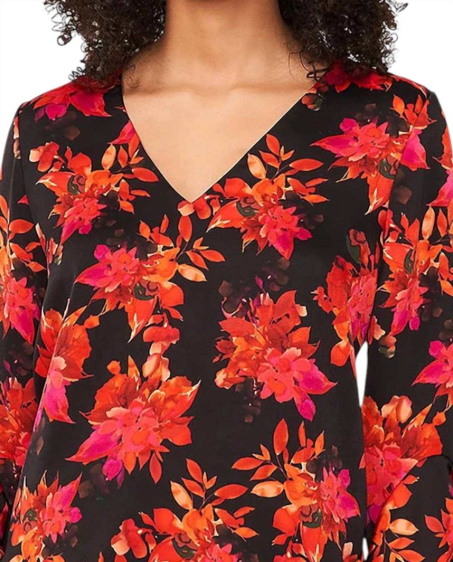 Top con cuello en V con estampado color negro