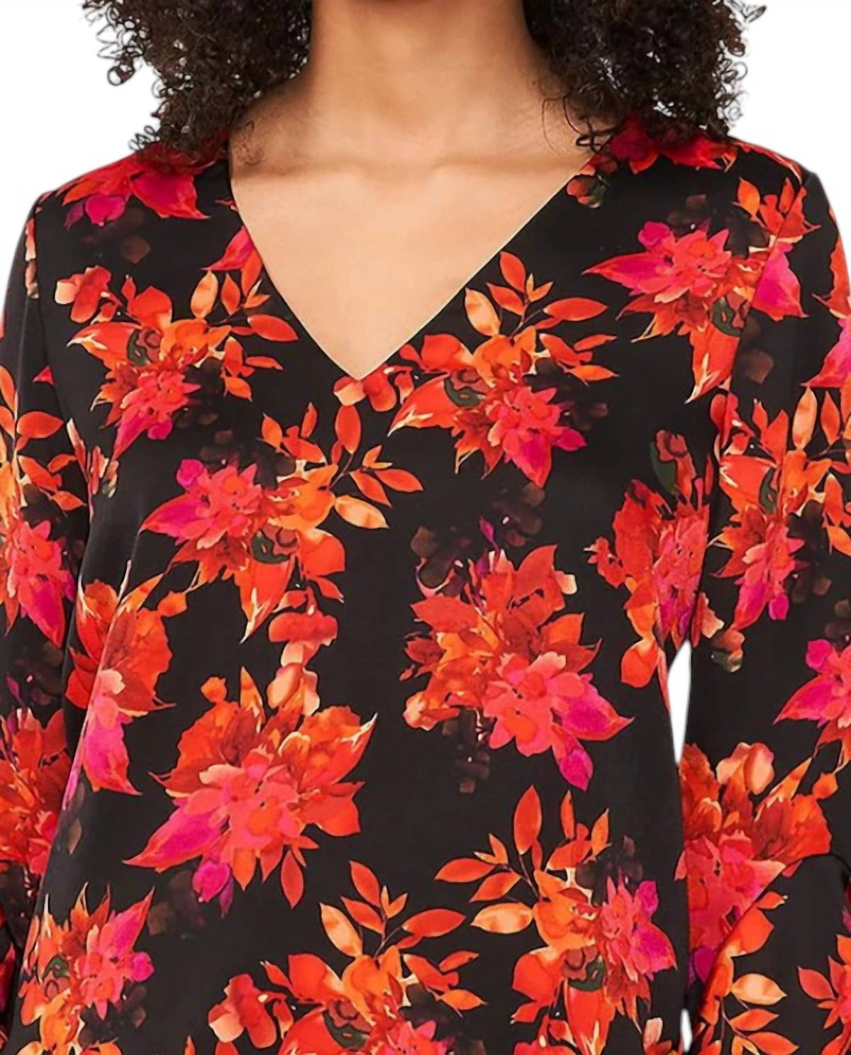 Top con cuello en V con estampado color negro