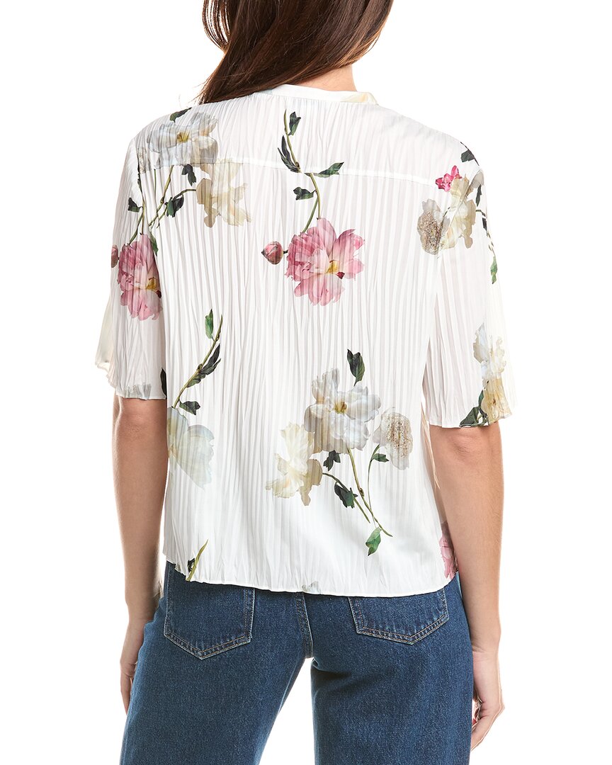 Camisa con pliegues
