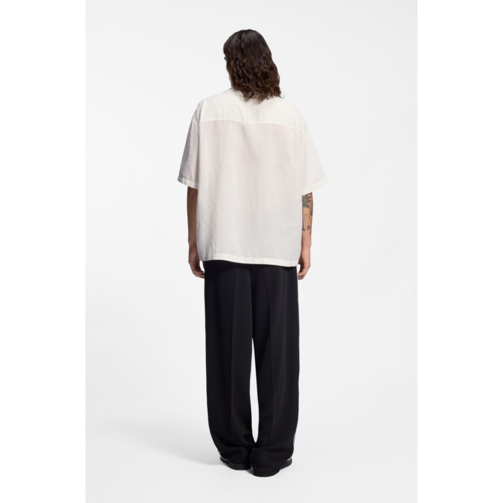 Camisa de corte amplio