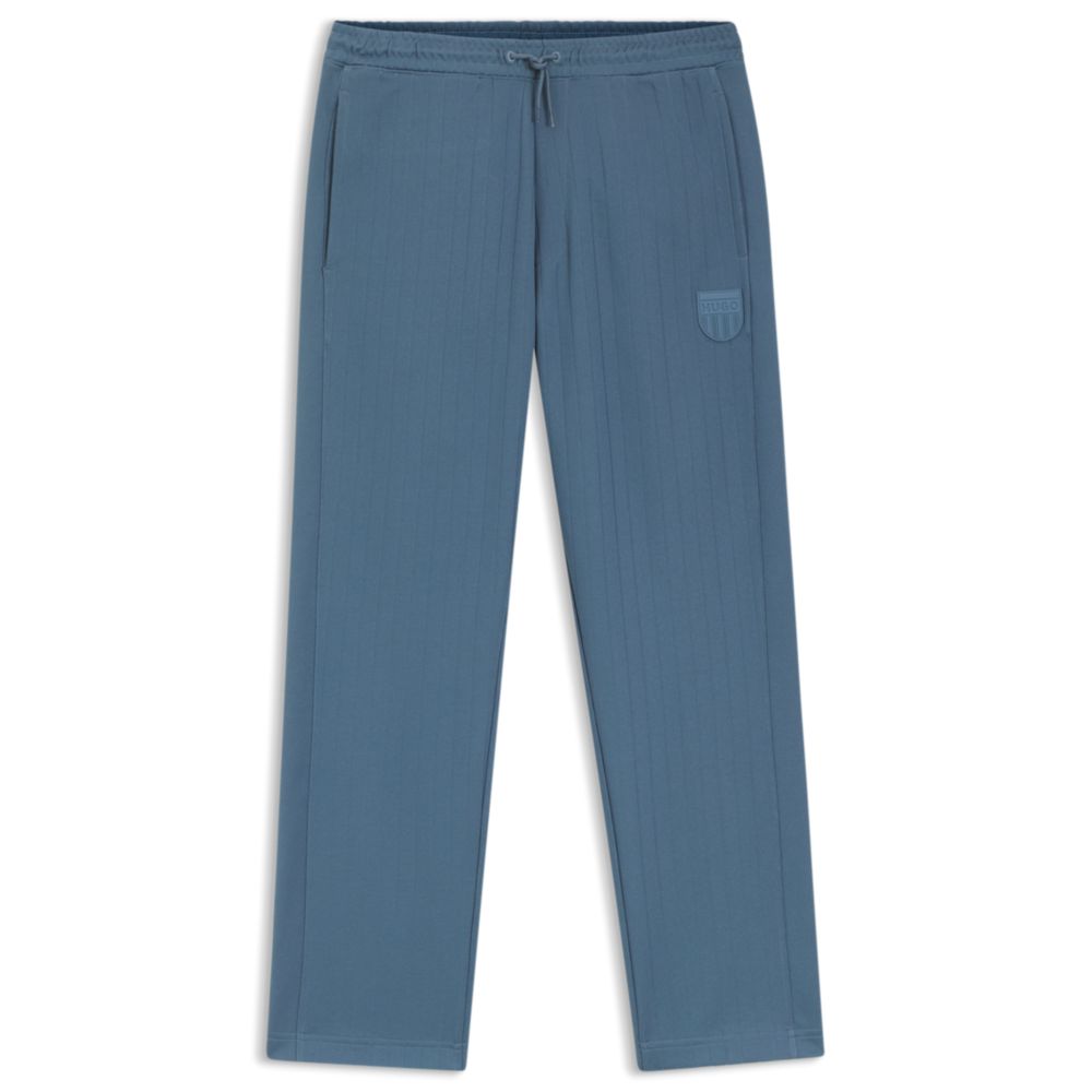 Pantalón deportivo de mezcla de algodón a rayas