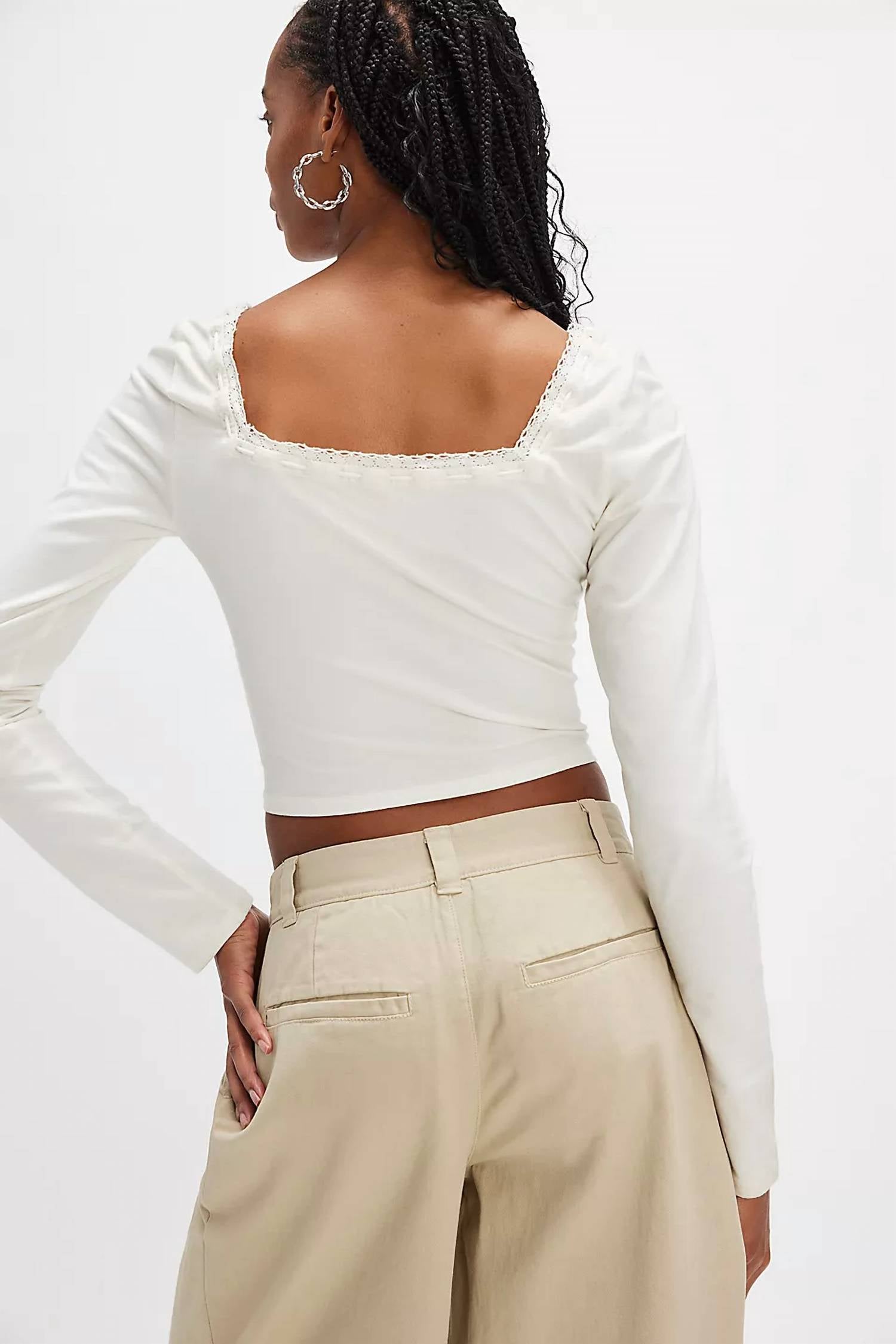 Top de manga larga color marfil