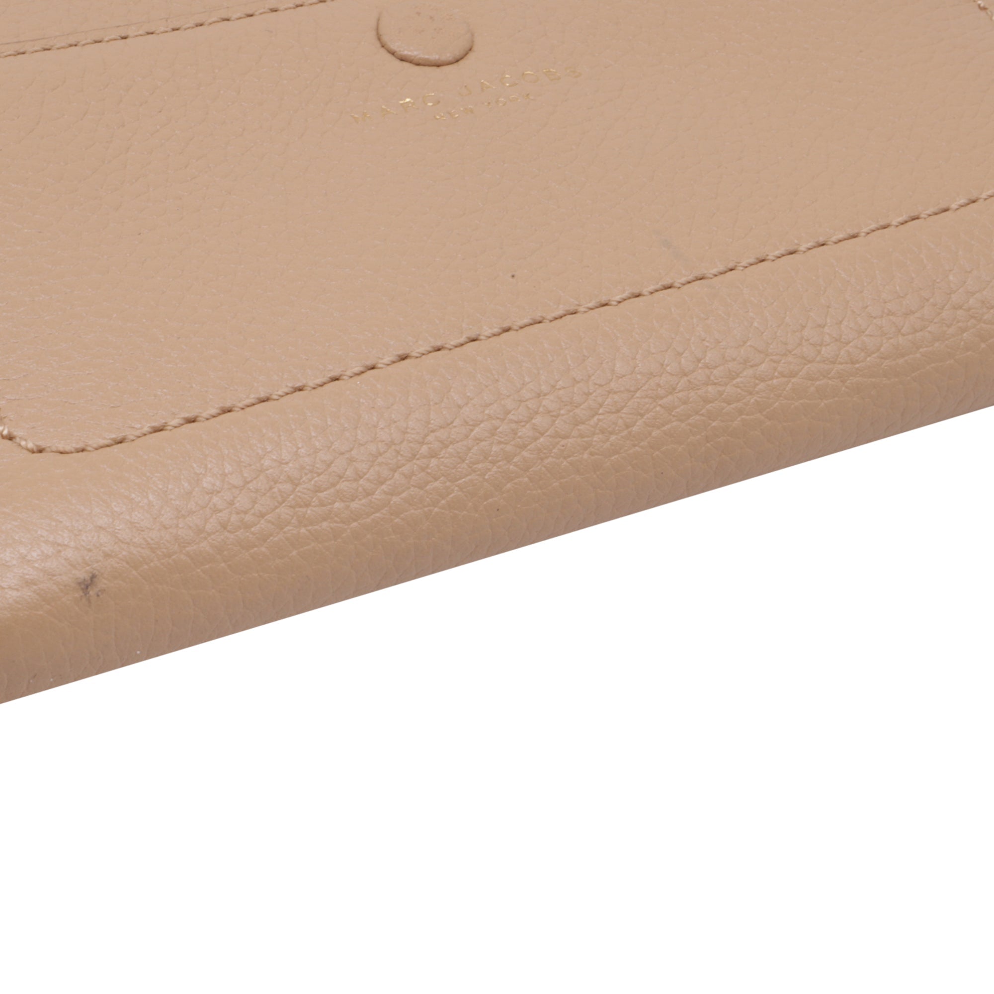Bolso cruzado de cuero color beige