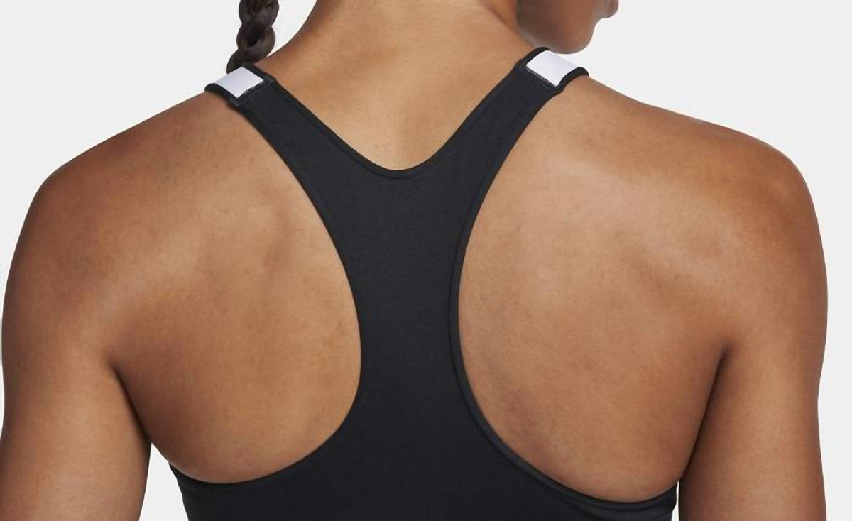 Top deportivo color negro y blanco