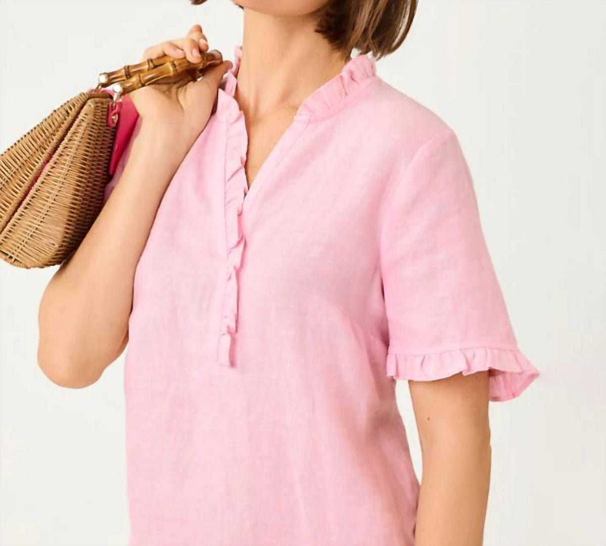 Camiseta sin mangas color blanco y rosado
