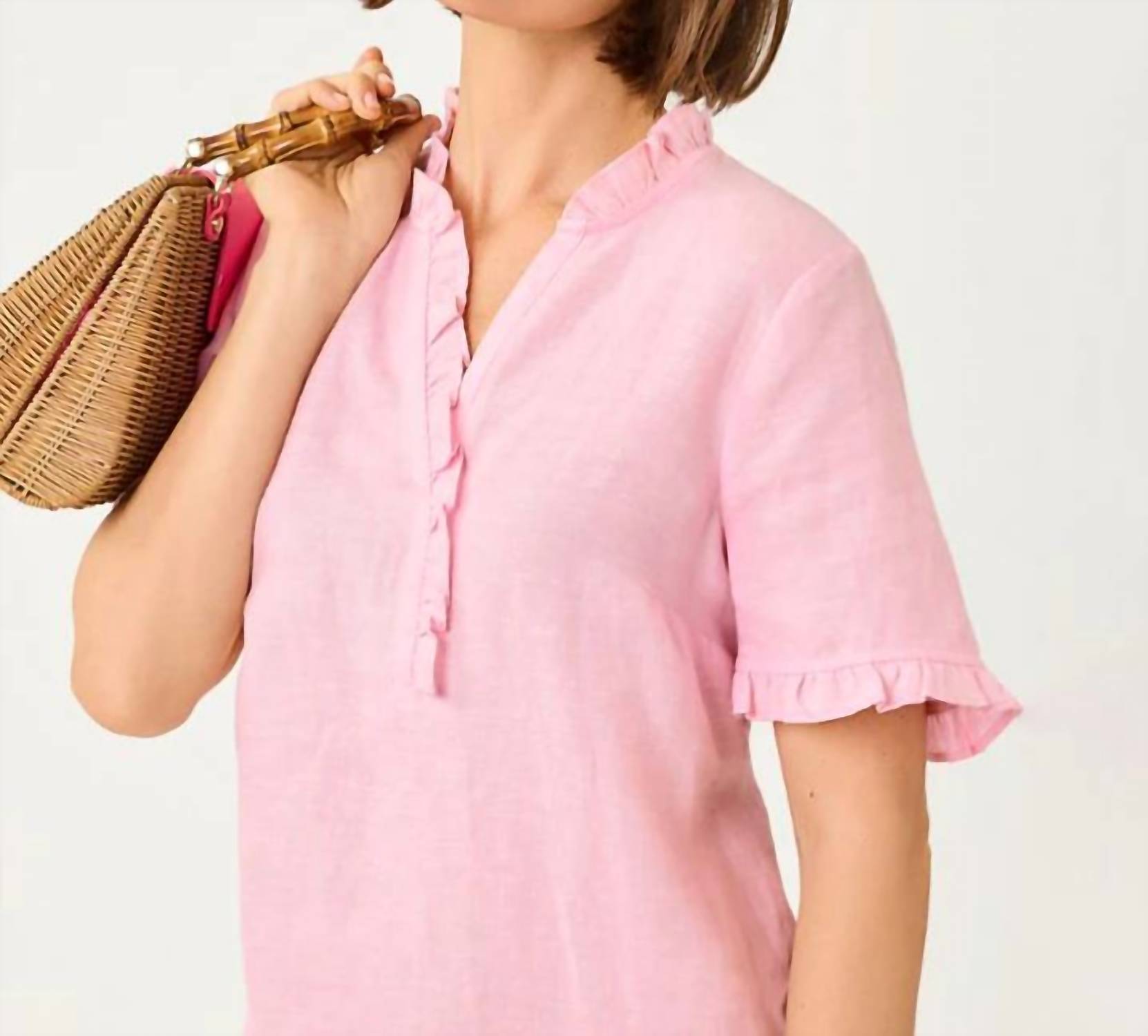 Camiseta sin mangas color blanco y rosado