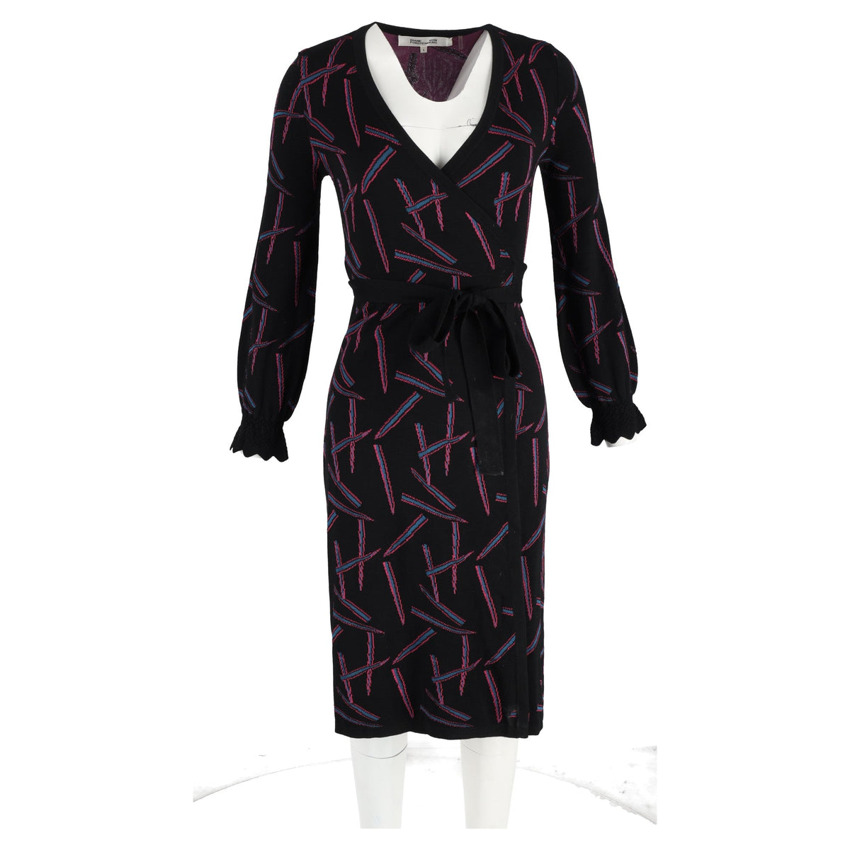 Vestido de lana con estampado color negro y rosado