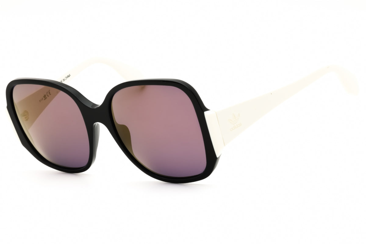 Gafas color negro y blanco y café