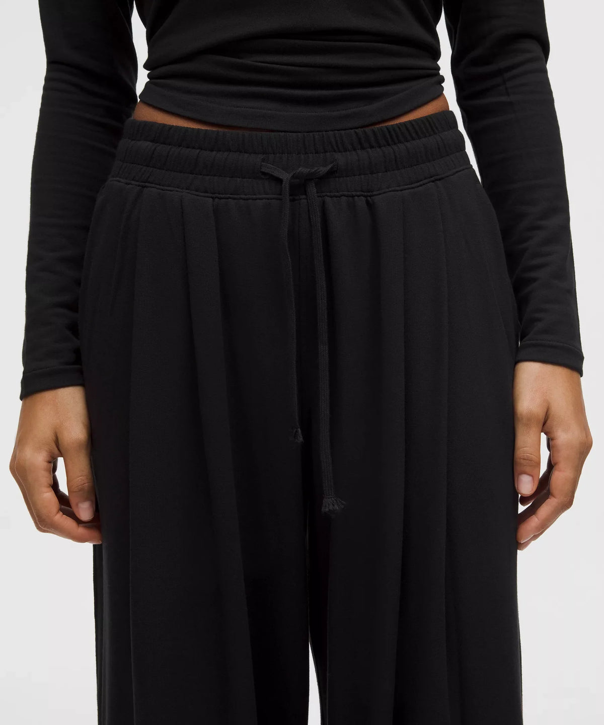 Pantalón de pierna ancha de tiro alto con pliegues
