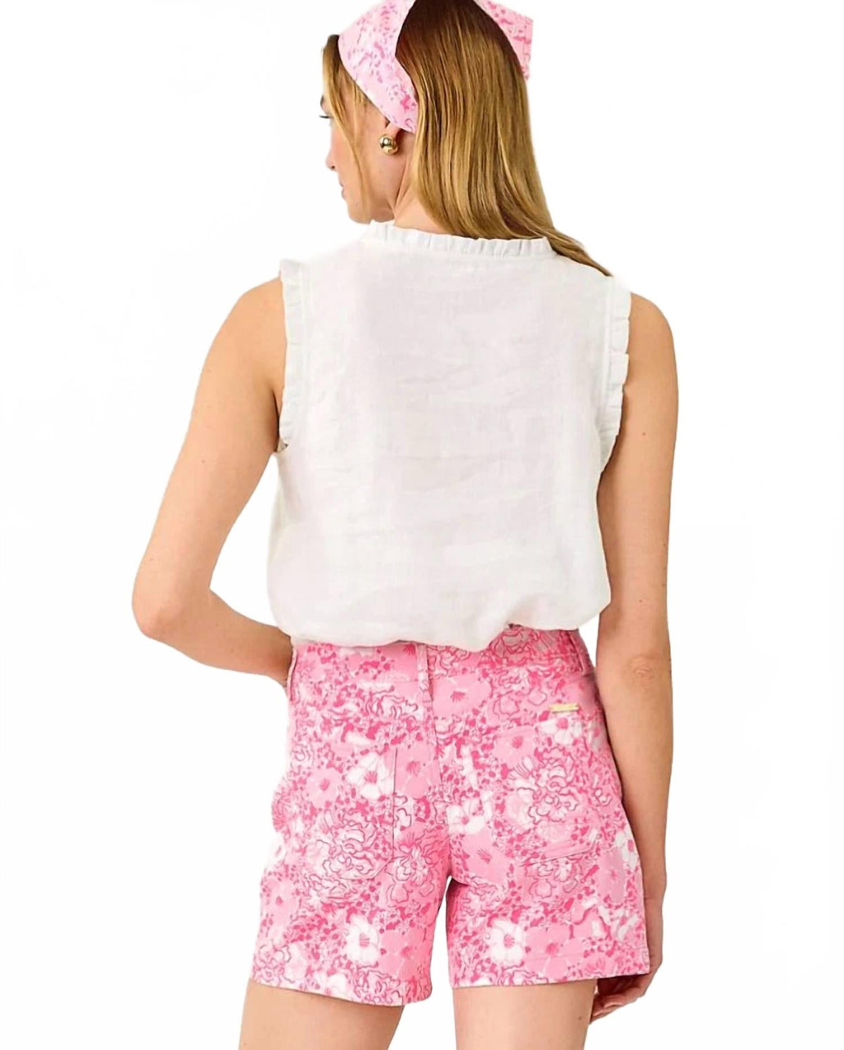 Top sin mangas con boleros color blanco