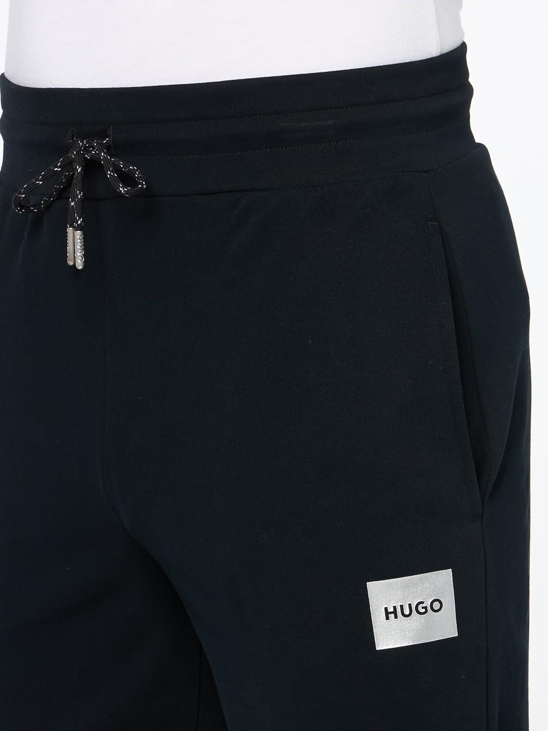 Pantalón deportivo de hombre color negro y plateado