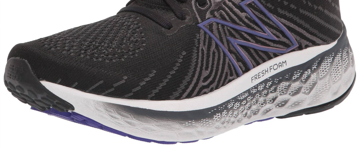Tenis para correr de hombre color negro y violeta