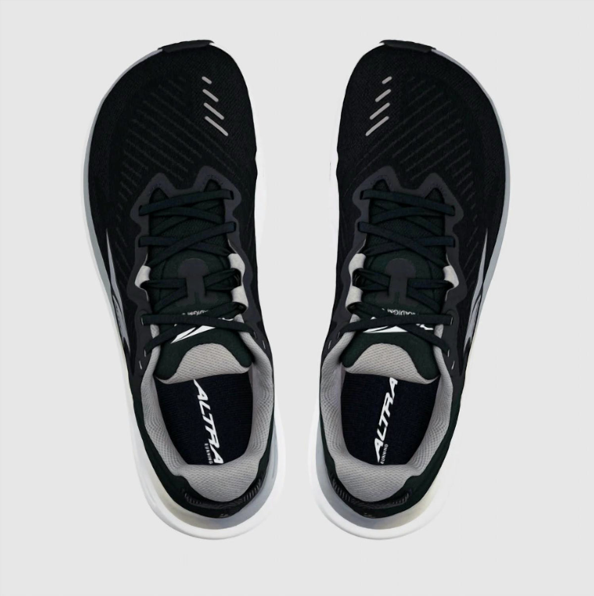 Tenis para correr de hombre color negro y blanco