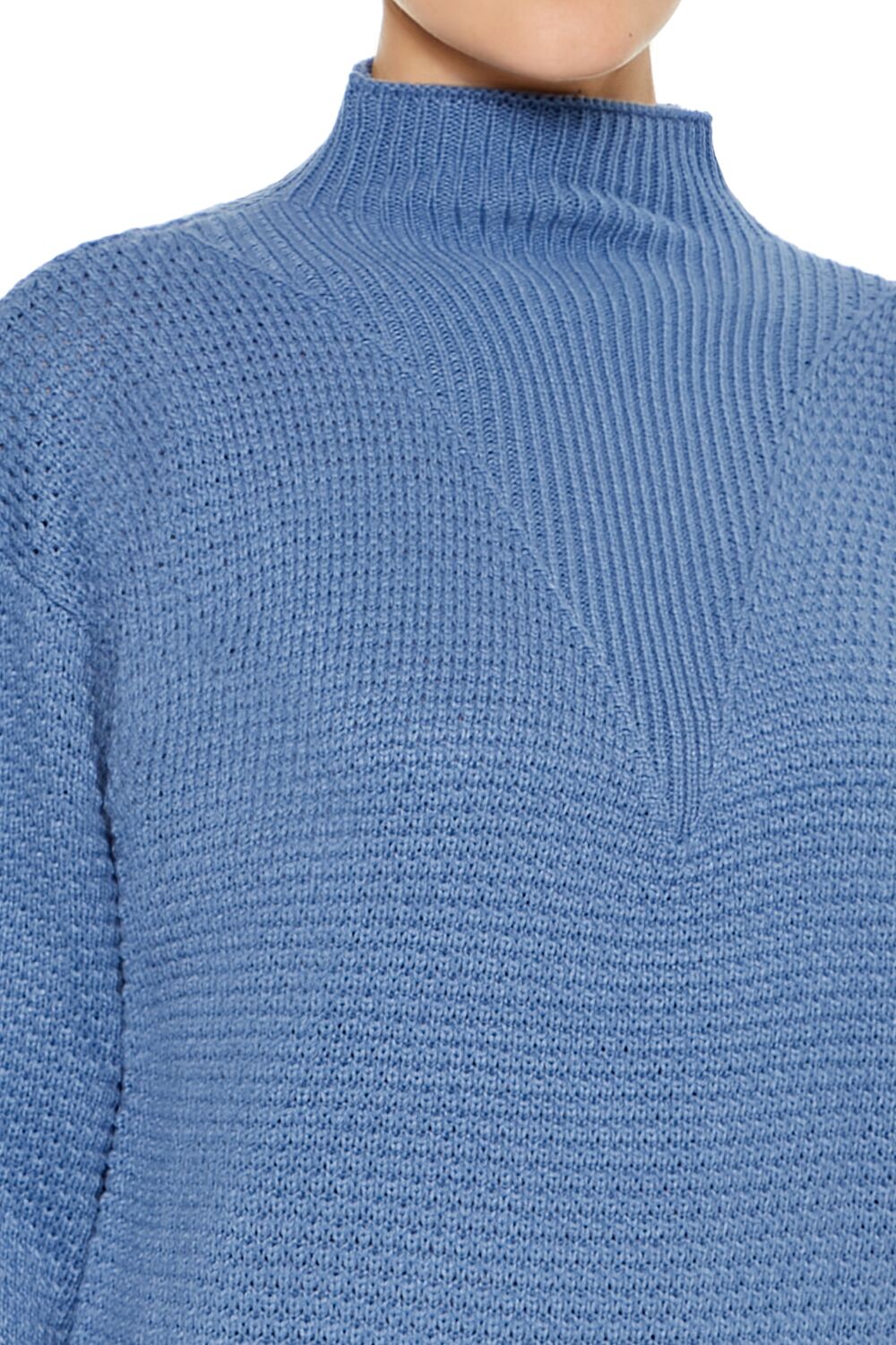 Suéter con cuello alto