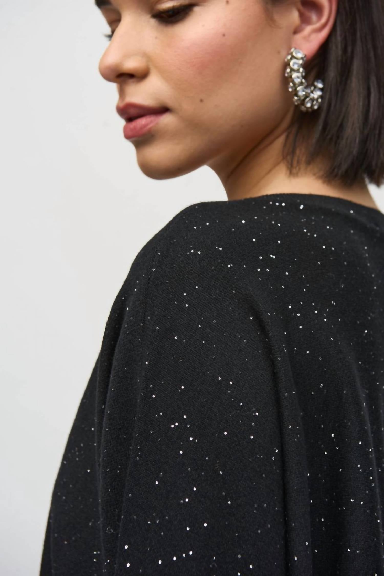 Top de mujer de manga larga con lentejuelas color negro