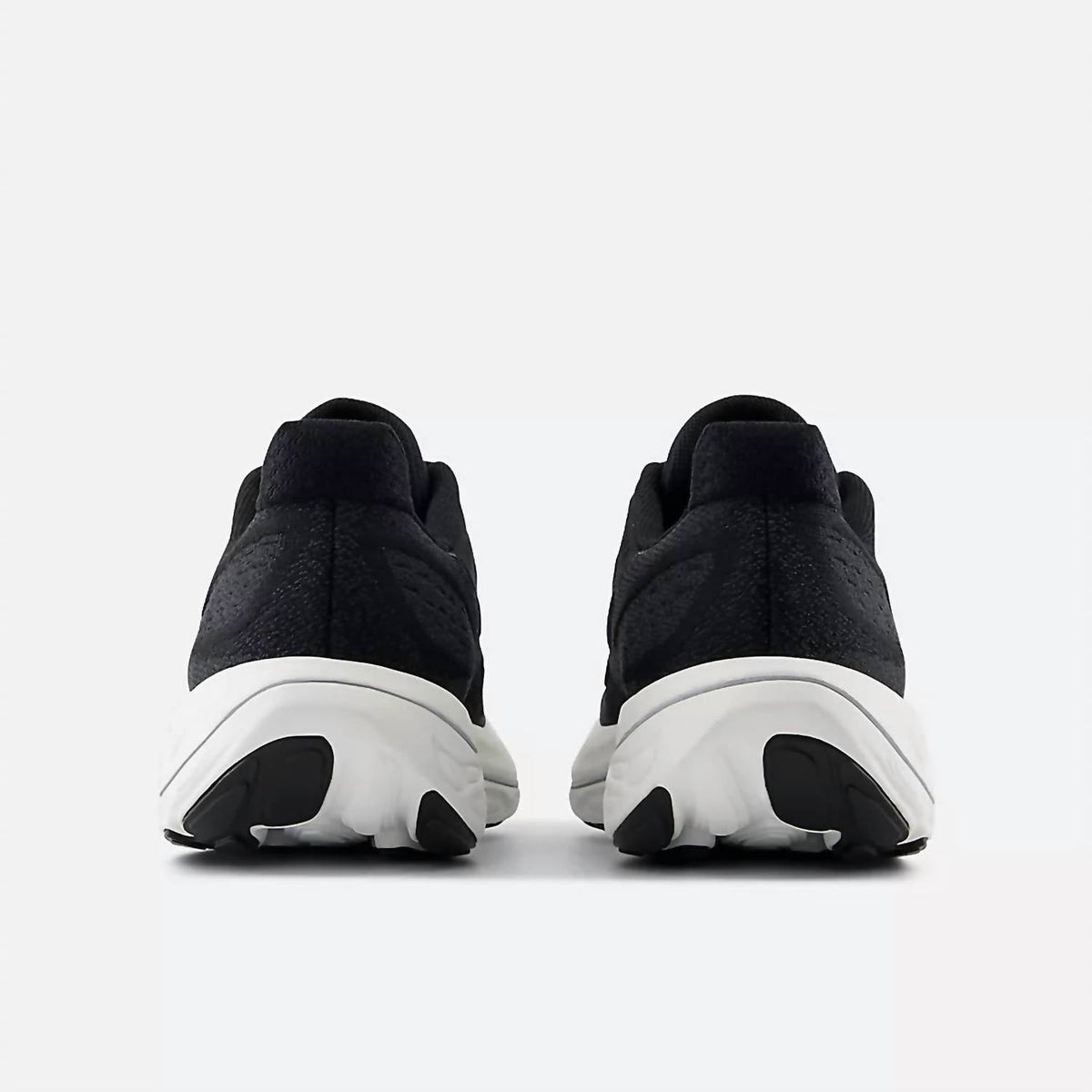 Tenis para correr de mujer color negro y blanco