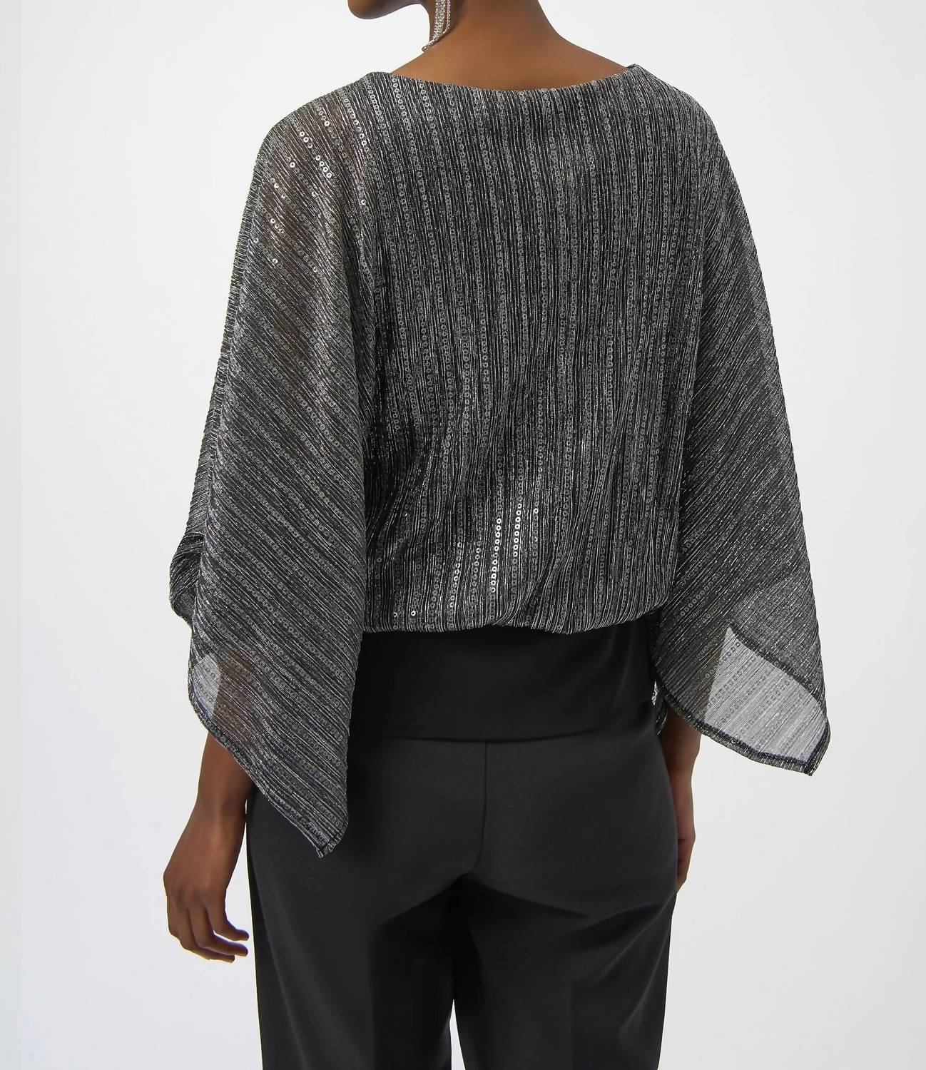 Top con lentejuelas color negro y plateado