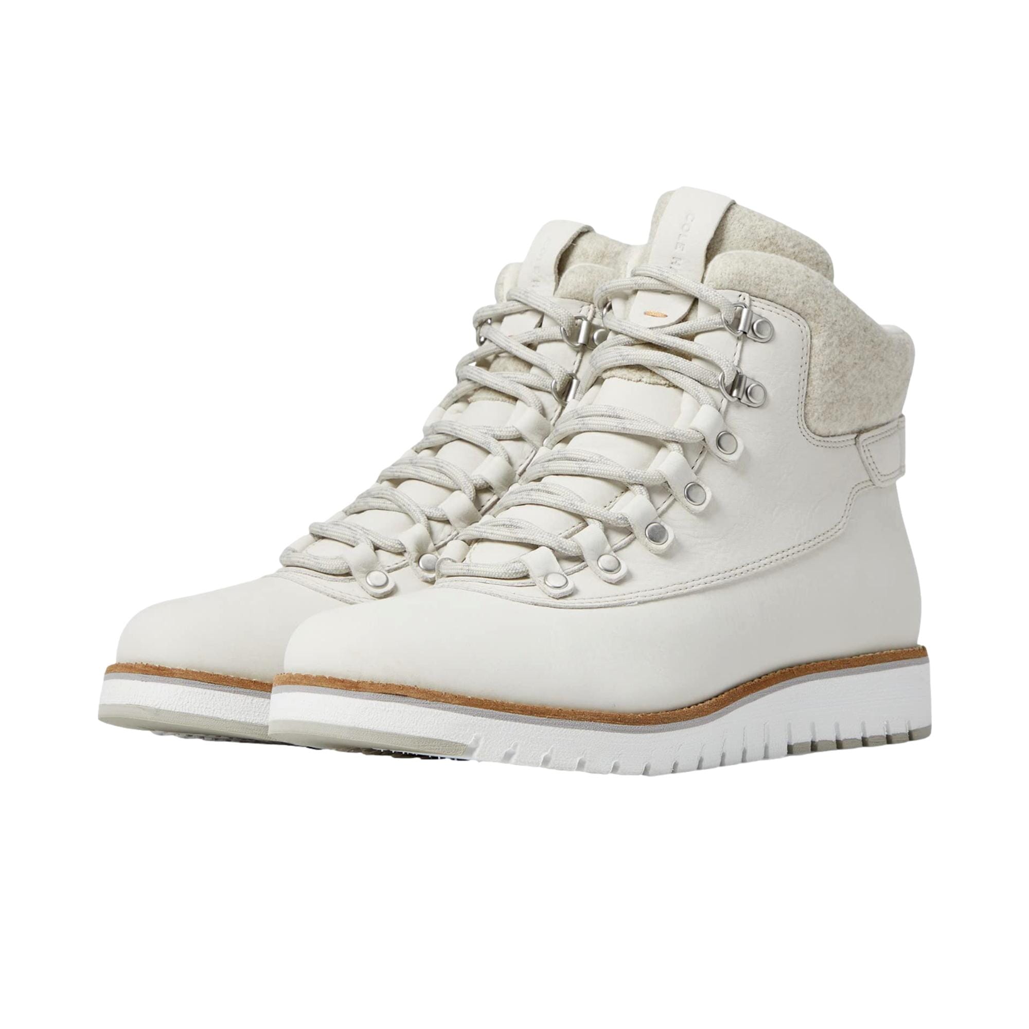 Botas de mujer impermeables color blanco y plateado