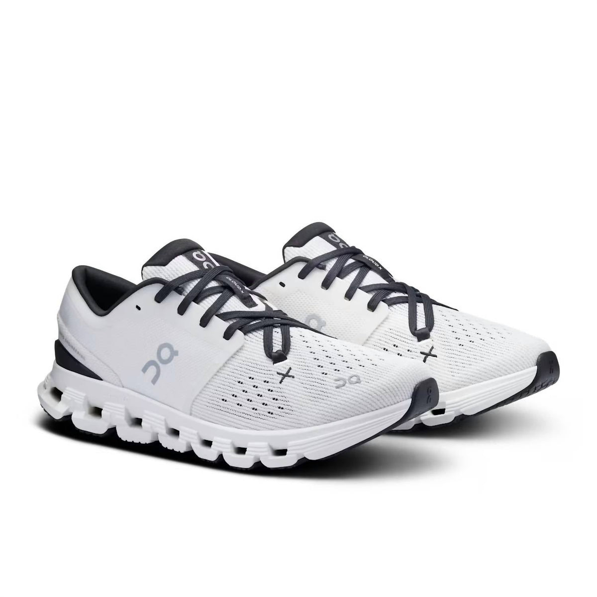 Tenis para correr de mujer color negro y marfil