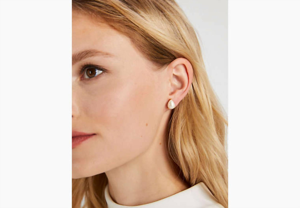 Aretes color dorado y crema