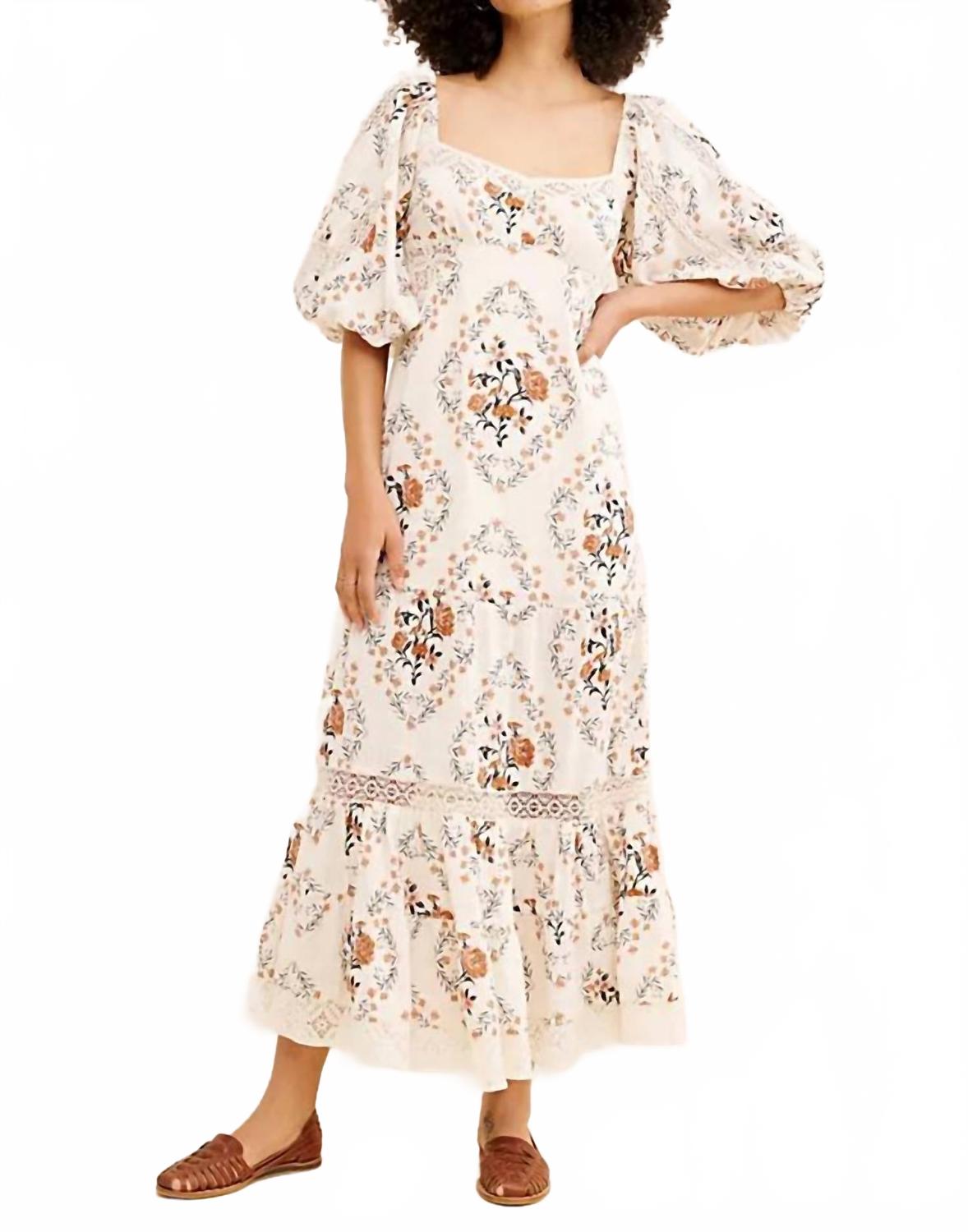 Vestido largo con estampado color beige