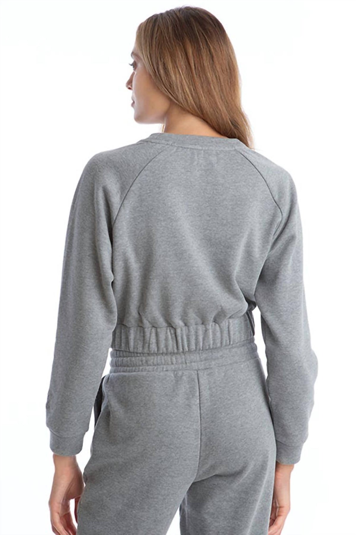Buzo color gris