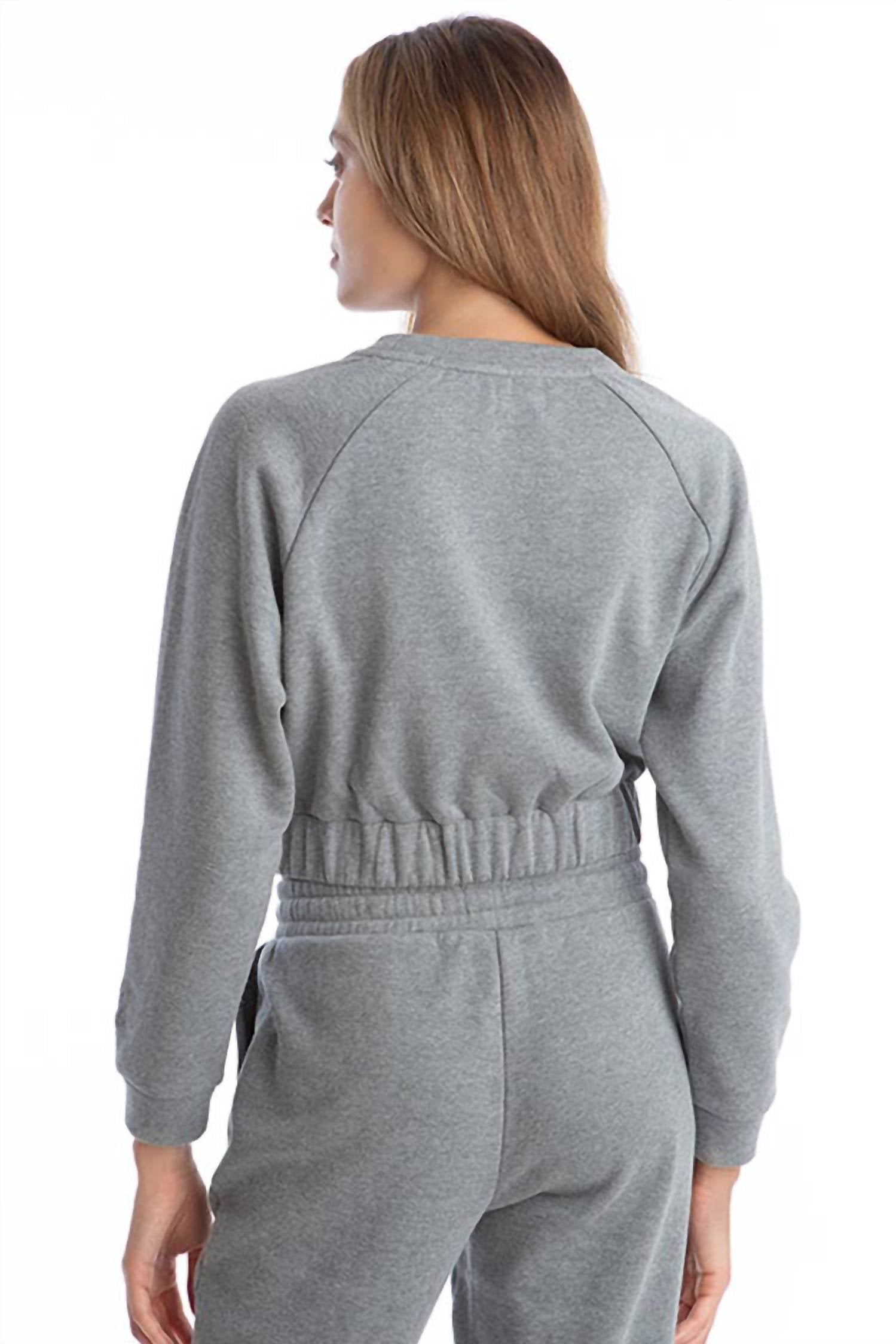 Buzo color gris