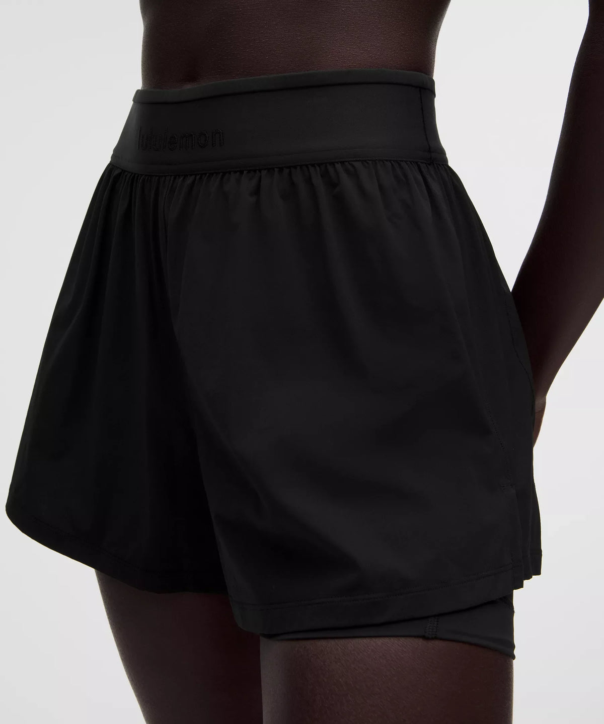 Short de tiro alto