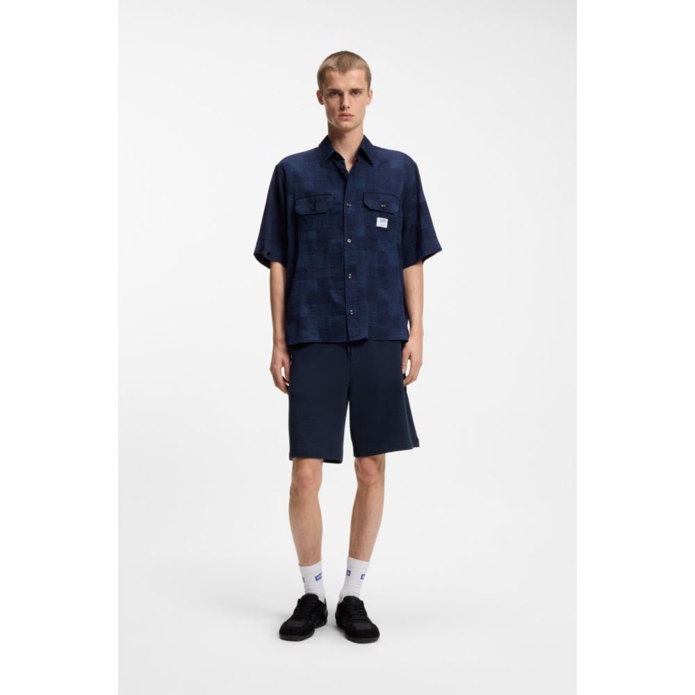 Camisa de corte amplio