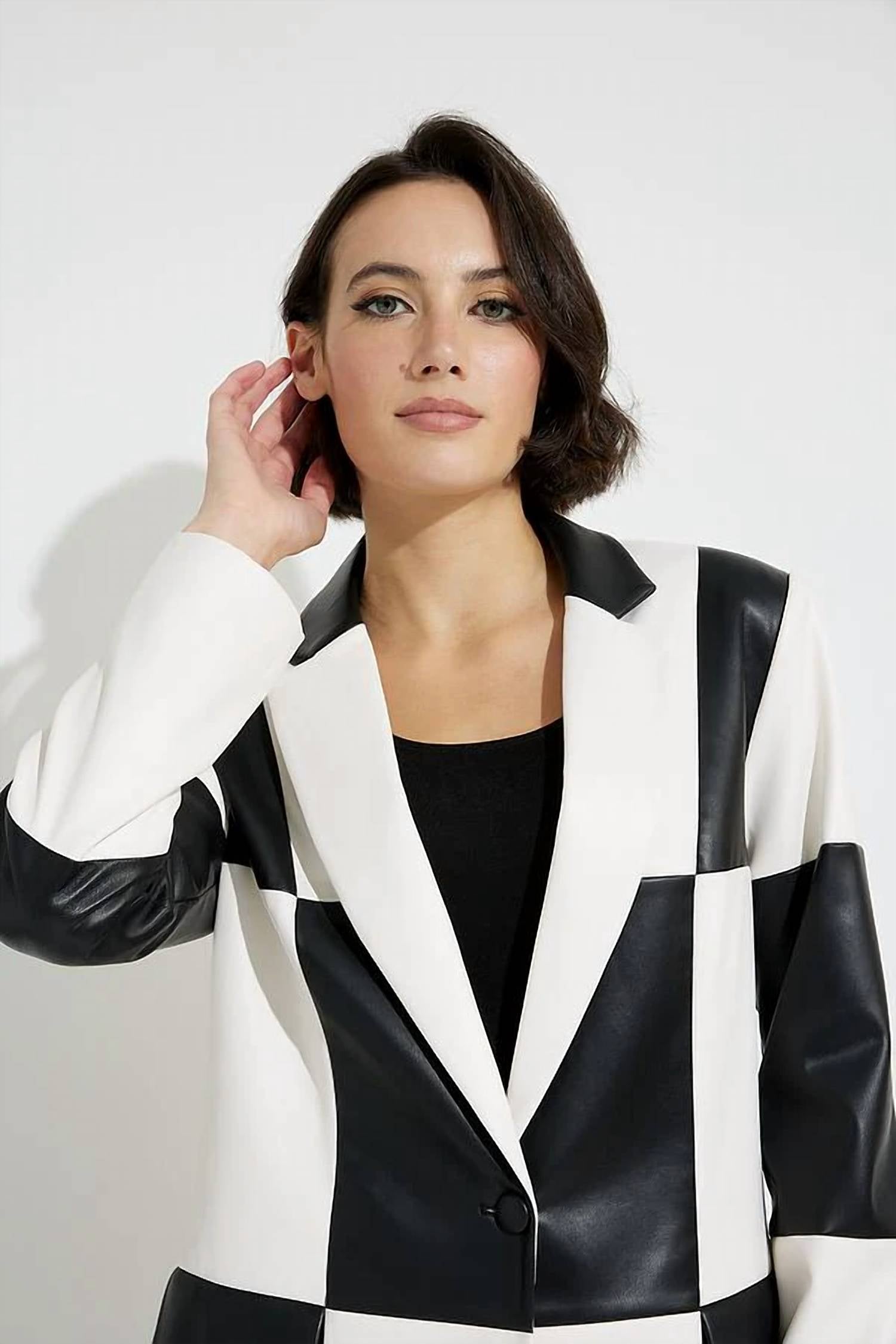Chaqueta de efecto cuero color negro y blanco