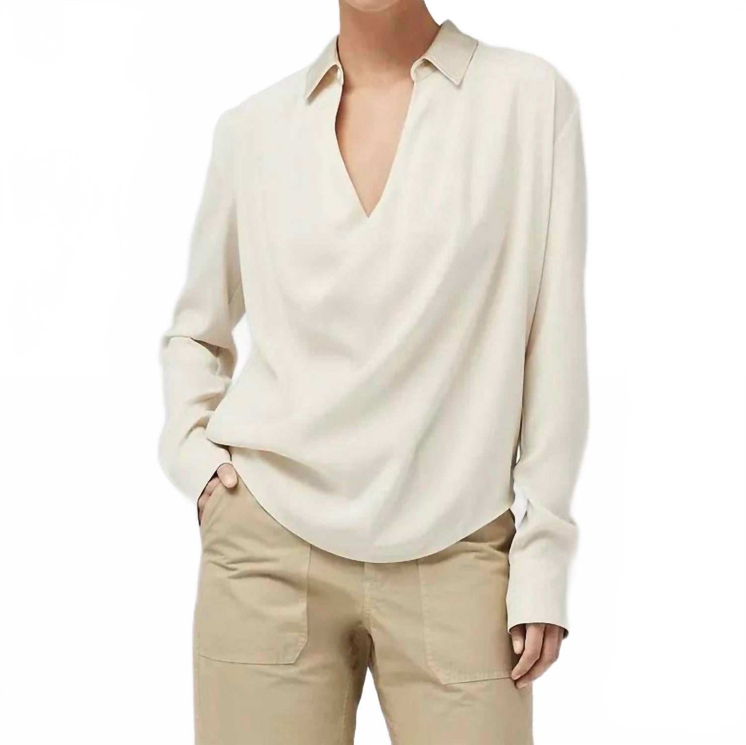 Blusa de satén color crema