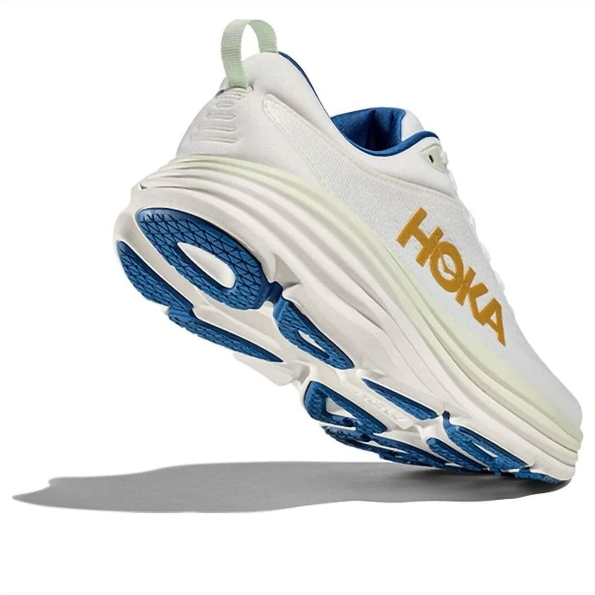 Tenis para correr de hombre color dorado