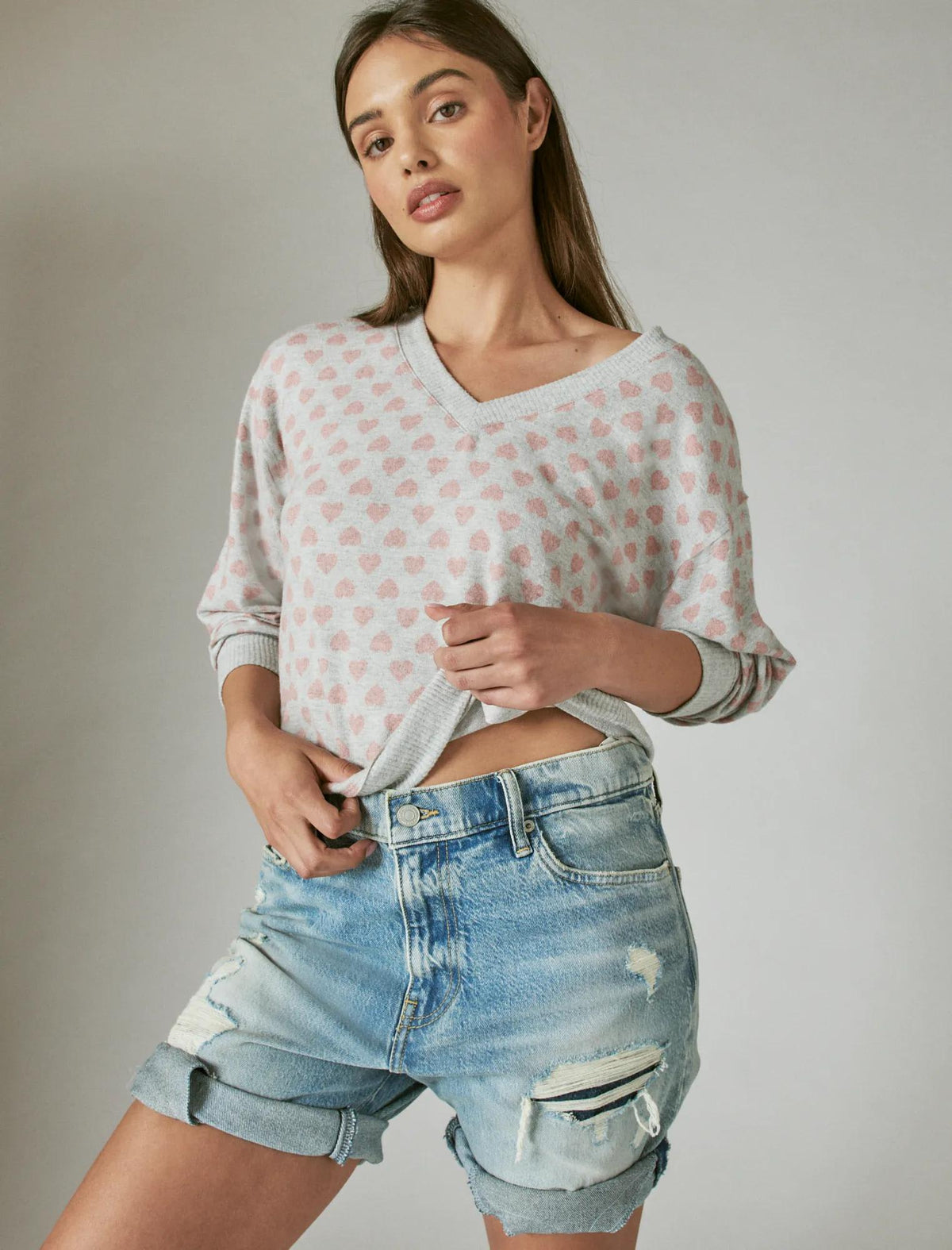 Top de mujer de manga larga con cuello en V